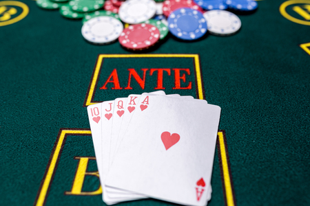 Poker chips on a poker table at the casino. Closeup. royal flush, winning combination. Chips winnerの写真素材