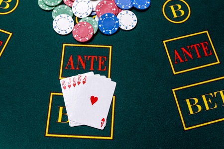 Poker chips on a poker table at the casino. Closeup. royal flush, winning combination. Chips winnerの写真素材