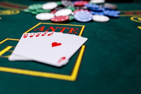 Poker chips on a poker table at the casino. Closeup. royal flush, winning combination. Chips winnerの写真素材