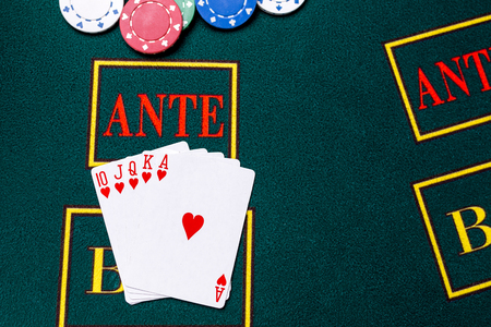 Poker chips on a poker table at the casino. Closeup. royal flush, winning combination. Chips winnerの写真素材