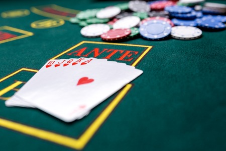 Poker chips on a poker table at the casino. Closeup. royal flush, winning combination. Chips winnerの写真素材