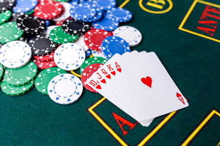 Poker chips on a poker table at the casino. Closeup. royal flush, winning combination. Chips winnerの写真素材