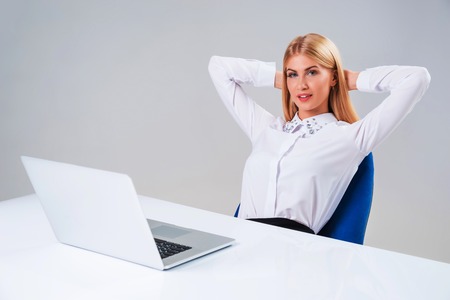 Young businesswoman working at laptop computer. she pleased, to do the work is happyの写真素材