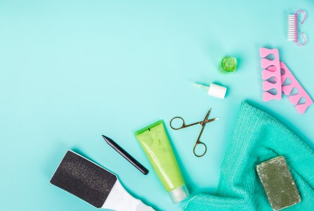 Top view of manicure and pedicure equipment on blue backgroundの写真素材