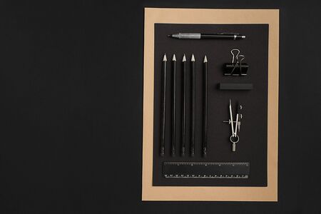 Mix of office supplies on a modern  deskの写真素材