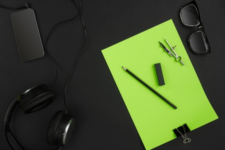 Mix of office supplies on a modern  deskの写真素材