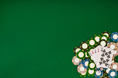 Poker. Banner template layout mockup for online casino. Green table, top view on workplace.