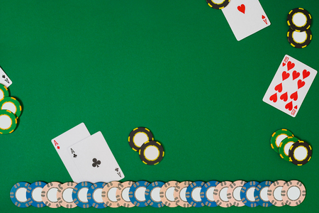 View from above with copy space. Banner template layout mockup for online casino. Green table, top view on workplace.の写真素材