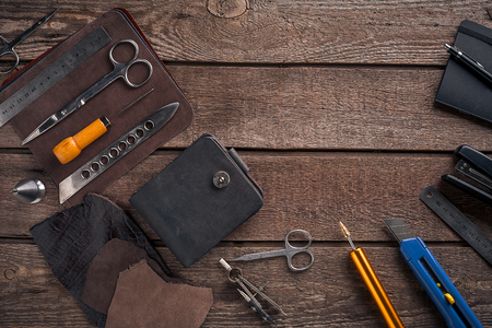 Leather crafting. Tools flat lay still life