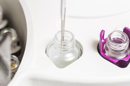 Small tube to machine in laboratory. Medicine, analyzesの写真素材