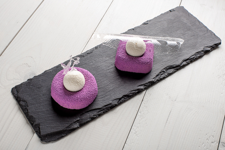Purple brownie with ice cream. Sweet dessert with iceの写真素材