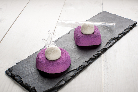 Purple brownie with ice cream. Sweet dessert with iceの写真素材