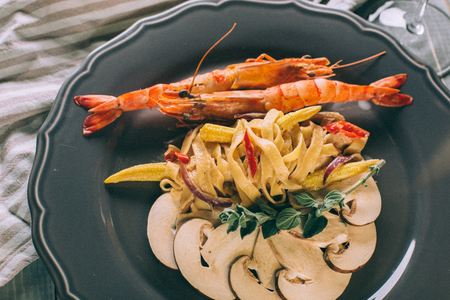 Noodles with shrimp and mushrooms. Spaghettiの写真素材