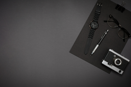 Black objects from the office on a dark gray background. Work anの写真素材