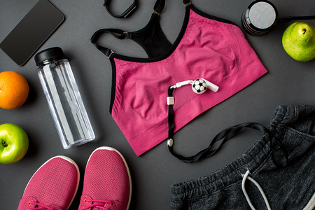 Sports accessories for fitness on the dark floor. Healthy lifestyle concept.の写真素材