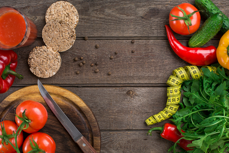 Fitness concept with vegetables. Fitness motivation with centimeter. Fitness motive. Pepper.の写真素材