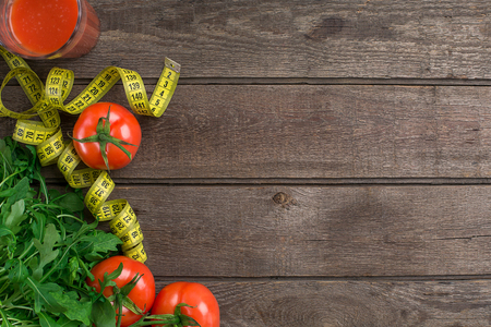 Fitness concept with vegetables. Fitness motivation with centimeter. Fitness motive. Pepper.の写真素材