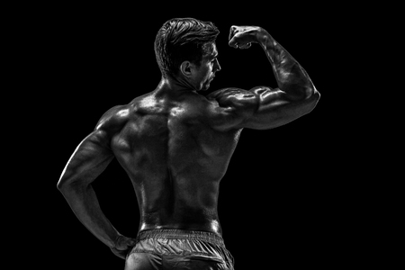 Strong Athletic Man Fitness Model posing back muscles, triceps oの写真素材
