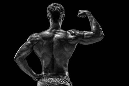 Strong Athletic Man Fitness Model posing back muscles, triceps oの写真素材