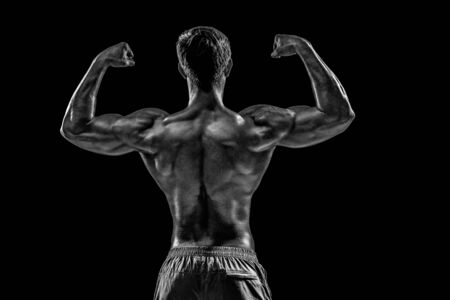 Strong Athletic Man Fitness Model posing back muscles, triceps oの写真素材