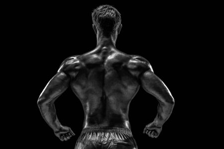Strong Athletic Man Fitness Model posing back muscles, triceps oの写真素材