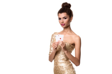 Pretty african girl shows two aces in casino poker and winの写真素材