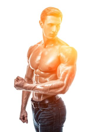 Muscular handsome young man with naked torso. Isolated on whiteの写真素材