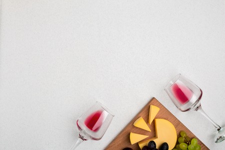 Glasses with red wine on white background from top viewの写真素材
