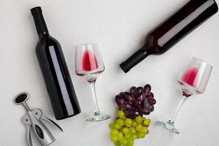 Two glasses of red wine and grapes. Top viewの写真素材