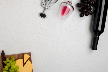 Wine, glasses and corkscrew over white background. Top viewの写真素材
