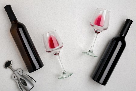 Two glasses of red wine and grapes. Top viewの写真素材