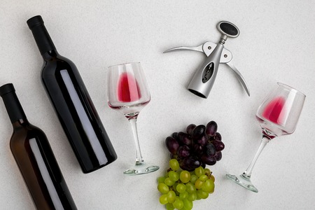 Two glasses of red wine and grapes. Top viewの写真素材