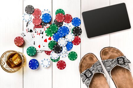 Post blog social media poker. Banner template layout mockup for online casino. Wooden white table, top view on workplace.の写真素材