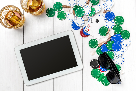 Post blog social media poker. Banner template layout mockup for online casino. Wooden white table, top view on workplace.の写真素材