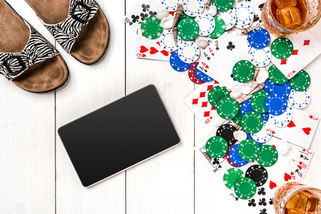 Post blog social media poker. Banner template layout mockup for online casino. Wooden white table, top view on workplace.の写真素材