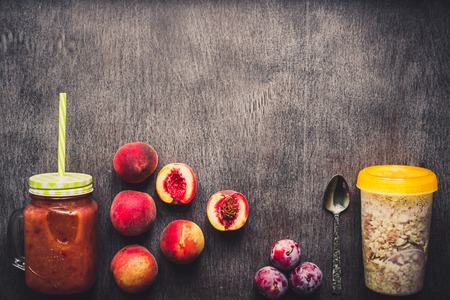 Fruit Smoothies. Peach and plum smoothie. Peach, plum and oatmeal. Delicious and healthy breakfastの写真素材
