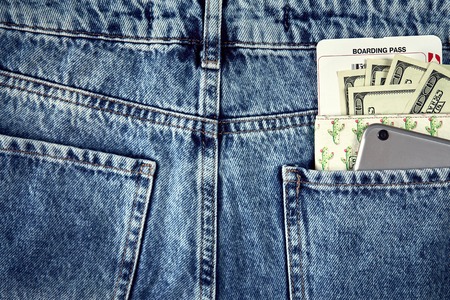 Cash and smart in your jeans pocket. Still life.