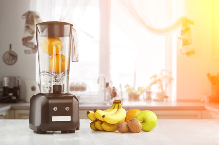 Blender, fruits and kitchen space. Sun flareの写真素材