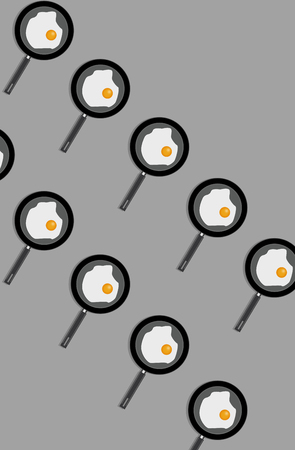 Funny background from scrambled eggs and frying panの写真素材