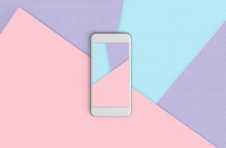 Phone with colorful screen on top view, background in pastel colors. Copy spaceの写真素材