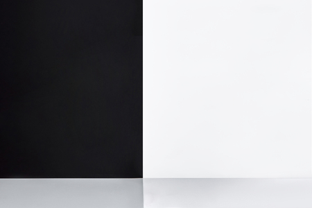 Black and white divided wall. Background. Copy spaceの写真素材