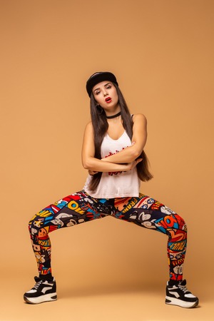 Modern style dancer posing on studio backgroundの写真素材