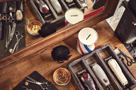 Hairdresser tools on woodenの写真素材