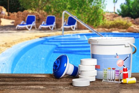 Equipment with chemical cleaning products and tools for the maintenance of the swimming pool.の写真素材