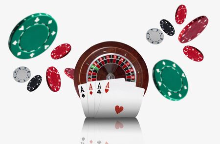 Close-up photo of four aces standing ahead of a brown roulette and chips which flying apart, isolated on white background. Gambling entertainment.の写真素材