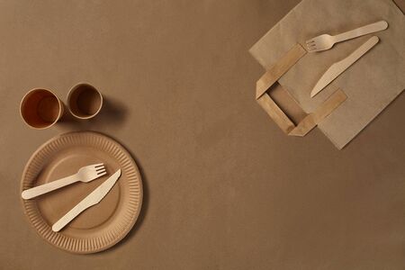 Eco friendly disposable tableware. Biodegradable craft dishes. Recycling concept. Also used in fast food, restaurants, takeaways, picnics. Close-up.の写真素材