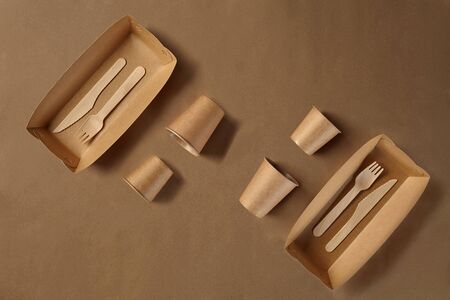 Eco friendly disposable tableware. Biodegradable craft dishes. Recycling concept. Also used in fast...