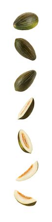 Set of delicious green tendral melons in cross-section, isolated on white background with copy space...