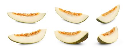 Six slices of green tendral melons in cross-section, isolated on white background with copy space for text or images. Side view. Close-up shot.の写真素材