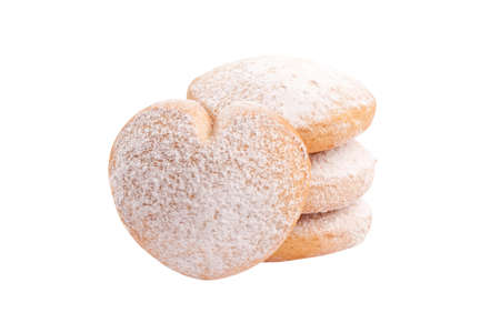 Heart shaped butter cookies with powdered sugar on white backgroundの写真素材